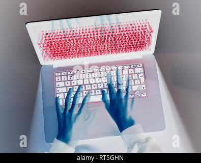 Hands of hacker coding computer virus on laptop Stock Photo - Alamy