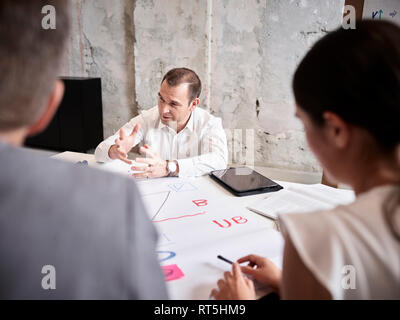 Business people having a meeting in conference room Stock Photo