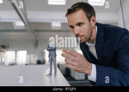 Businessman watching his Â§D portrait Stock Photo