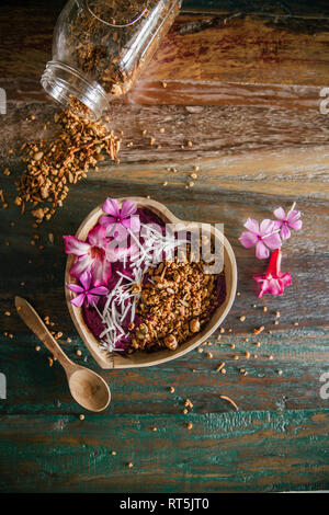 Acai Bowl with coconut flakes and pumpkin granola Stock Photo