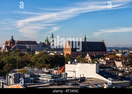 Poland, Krakow, historic city center cityscape with Wawel Castle and Holy Trinity Church Stock Photo