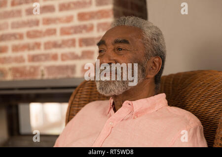 Senior man relaxing at home Stock Photo