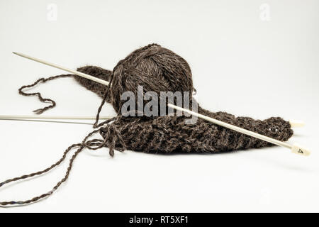 Ball of yarn and knitting needles Stock Photo