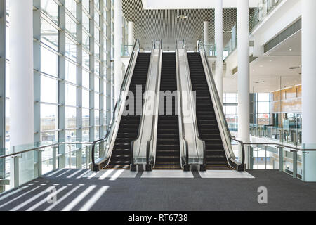 Escalators in an office building Stock Photo
