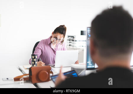 Designers working in office Stock Photo