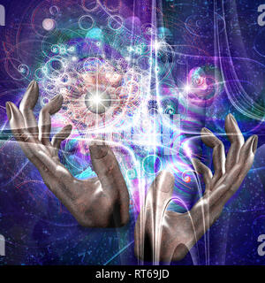 Hands manipulate atomic or other properties of universe Stock Photo