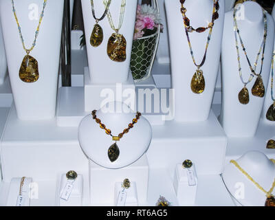 Products and jewelry from amber. Processed amber Stock Photo
