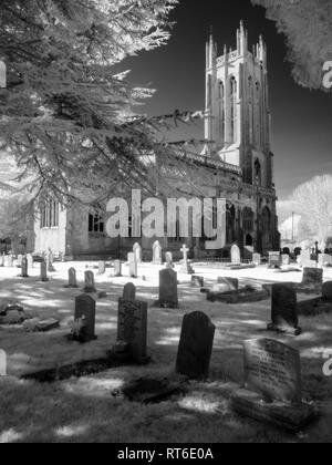 Infrared monochrome of All Saints Church in the North Somerset village of Wrington, England. Stock Photo