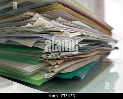 Stacked of paper documents in the office Stock Photo