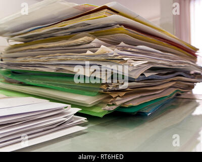 Stacked of paper documents in the office Stock Photo