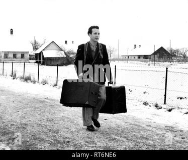 'Sweeney Steps Out.' Sweeney is the star of one of the many instructive and entertaining movie shorts the Linz, Upper Austria American House lends to volunteer operators who display them at rural schools and social centers. Stock Photo