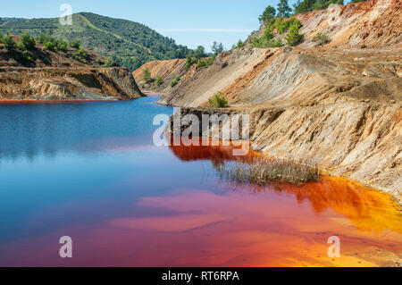 An abandoned copper mine-pit lake in Cyprus Stock Photo