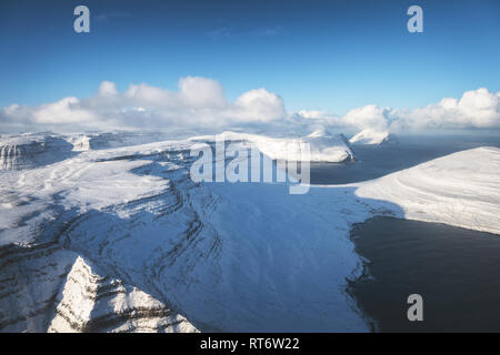 Aerial landscape of the Faroe Islands during winter. Stock Photo