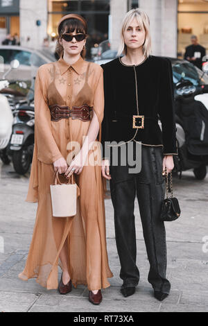 Milan, Italy - February 20, 2019: Street style outfits - models, bloggers and influencers before a fashion show during Milan Fashion Week - MFWFW19 Stock Photo