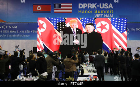 Beijing, Vietnam. 27th Feb, 2019. People watch a TV live broadcast about top leader of the Democratic People's Republic of Korea (DPRK) Kim Jong Un meeting with U.S. President Donald Trump in Hanoi, Vietnam, Feb. 27, 2019. Kim and Trump met Wednesday night in the Vietnamese capital of Hanoi for their second summit to discuss concrete ways for peace on and denuclearization of the Korean Peninsula. Credit: Wu Xiaochu/Xinhua/Alamy Live News Stock Photo