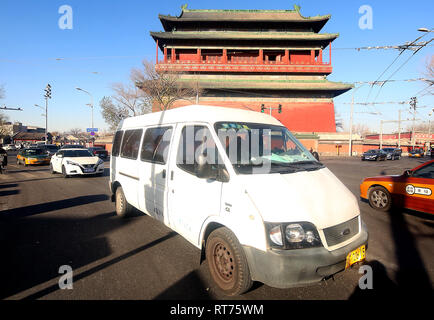 Beijing, China. 4th Dec, 2018. A Ford van drives past the Drum Tower in central Beijing on December 4, 2018. The U.S. expects China to take immediate action to cut tariffs on American car imports as the two countries move toward a broader trade deal, according to the White House. Credit: Todd Lee/ZUMA Wire/ZUMAPRESS.com/Alamy Live News Stock Photo