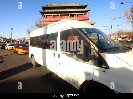 Beijing, China. 4th Dec, 2018. A Ford van drives past the Drum Tower in central Beijing on December 4, 2018. The U.S. expects China to take immediate action to cut tariffs on American car imports as the two countries move toward a broader trade deal, according to the White House. Credit: Todd Lee/ZUMA Wire/ZUMAPRESS.com/Alamy Live News Stock Photo