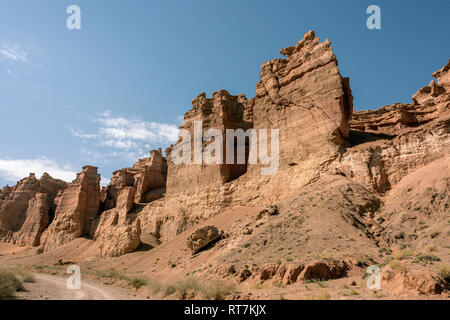Sedimentary red limestone cliffs in the Valley of Castles, Charyn Canyon, Kazakhstan Stock Photo