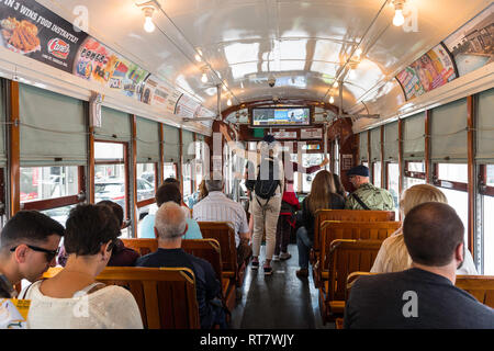 New Orleans streetcar, interior view of the St Charles streetcar showing passengers about to leave, New Orleans, Louisiana, USA. Stock Photo