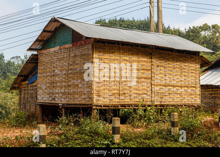 A poor village hut made of wood and clay. The traditional African home ...