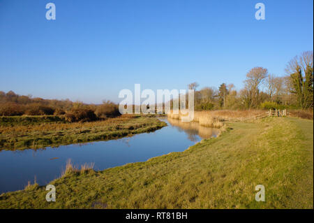 Cuckmere river meandering through the Cuckmere valley in East Sussex, UK. Stock Photo