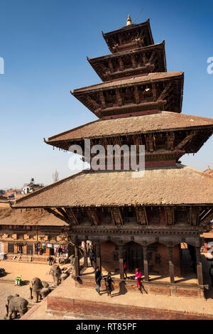 Nepal, Kathmandu Valley, Bhaktapur, Taumadhi Tole, Nyatapola Temple, tourists on top tier below wooden structure Stock Photo