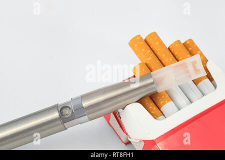 e-cigarette and one open box of tobacco cigarettes Stock Photo