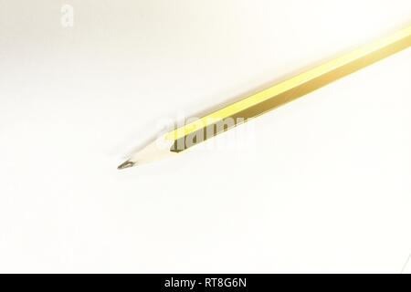 pencil on plain white paper. background for idea formulation and writing concepts. Stock Photo