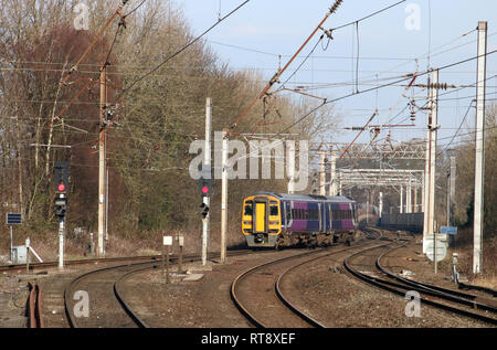 Class 158 express sprinter diesel multiple unit leaving Lancaster station on WCML and approaching Carlisle Bridge on 25th February  2019. Stock Photo