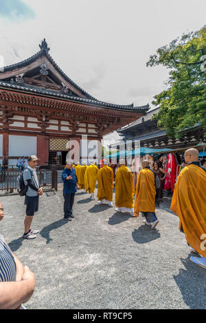 Kyoto, Japan - August 21, 2017 : Buddhist Monks and pilgrims during Kobo-ichi Market celebration at To-ji Temple Kyoto Kodo Lecture hall Stock Photo