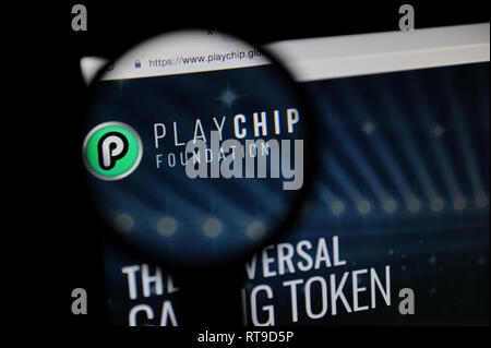 The PlayChip website seen through a magnifying glass Stock Photo