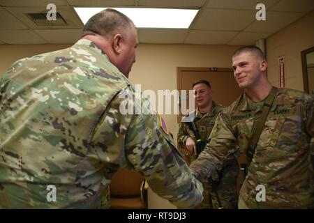 U.S. Army Maj. Gen. Van McCarty, South Carolina National Guard, deputy adjutant general-Army, visited with Soldiers of the 1221st Engineer Clearance Company at Ft. Bliss, Texas, Jan. 27, 2019, as they conducted pre-mobilization training. Stock Photo