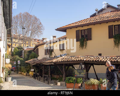 MILAN, ITALY-FEBRUARY 15, 2019: Medieval country houses with the tile roofs near the Naviglio Grande canal Stock Photo