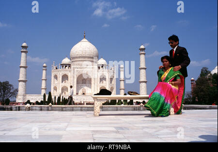 Indian,Couple, having their, photograph, taken by photographer, photo,  in, front of, Taj Mahal Agra, India, Stock Photo