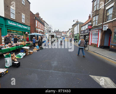 Busy High Street on Market Day in the market town of Driffield in the East Riding of Yorkshire. England, UK, GB. Stock Photo