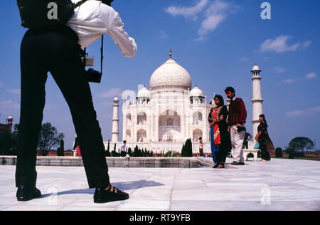 Indian,Couple, having their, photograph, taken by photographer, photo,  in, front of, Taj Mahal Agra, India, Stock Photo