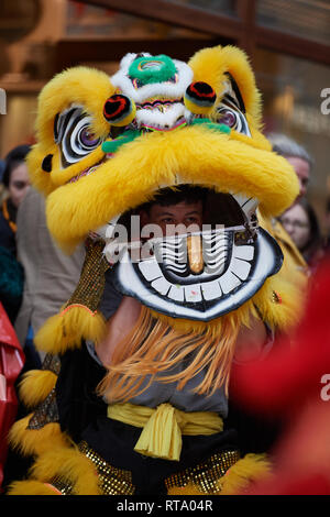 Chinese New Year.  Lion Dance performed by two dancers to bring prosperity and good luck for the upcoming year Stock Photo