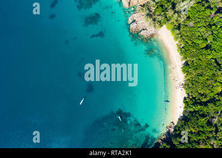 View from above, aerial view of a beautiful tropical beach with white sand and turquoise clear water, Banana beach, Phuket, Thailand. Stock Photo
