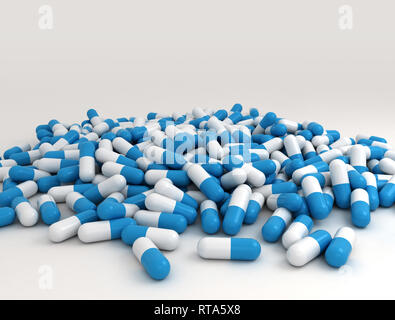 Close up image of large pills of blue pills scattered. 3D render Stock Photo