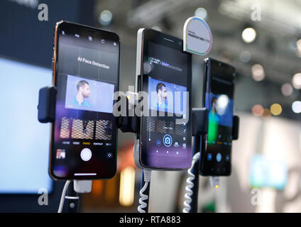 Mobile phones with face recognition system seen at the Mobile World Congress in Barcelona Stock Photo