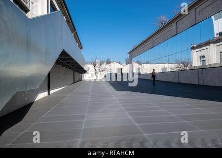 Mirrors and reflections in one of the courtyards of the Fondazione Prada, Milan, Italy Stock Photo