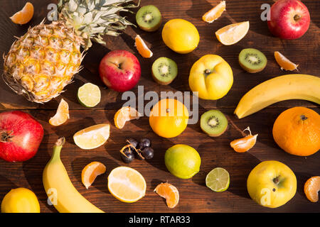 Fruits and vegetables on wooden board - top view Stock Photo