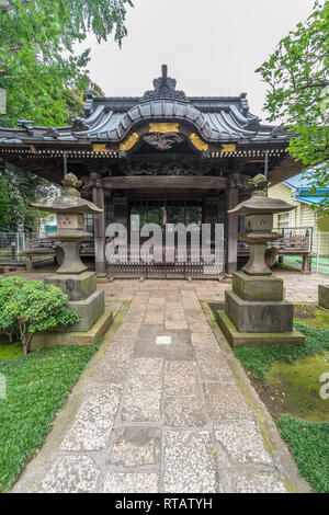 Setagaya, Tokyo, Japan - August 19, 2017: Moriiwao Temple. Awashimado hall devoted to Awashima-sama shinto deity who protects women from illness Stock Photo