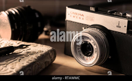 vintage lomo film camera with notebook Stock Photo
