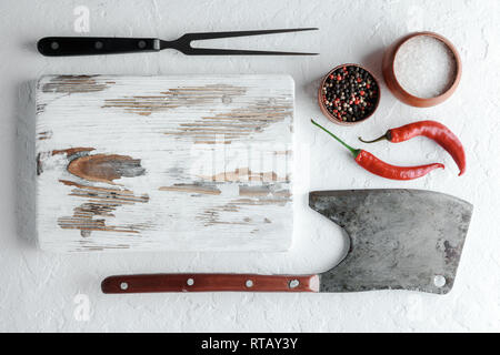 Old rustic white wood board on rustic concrete table. Food photography Stock Photo