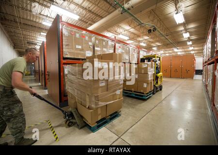 https://l450v.alamy.com/450v/rtayax/us-air-force-basic-military-training-trainee-and-maricel-gomez-502d-logistics-readiness-squadron-material-handler-unload-basic-military-training-supplies-in-preparation-for-initial-and-secondary-clothing-issue-feb-4-2019-at-joint-base-san-antonio-lackland-texas-the-502d-lrs-is-responsible-for-issuing-and-fitting-individual-uniforms-for-over-1600-bmt-trainees-weekly-rtayax.jpg
