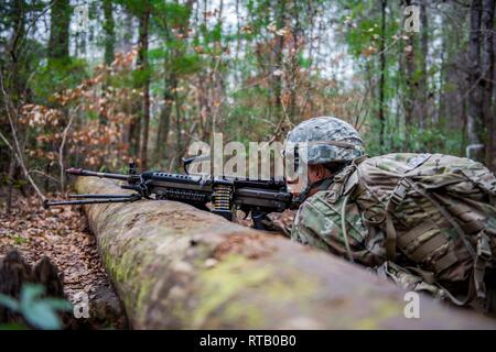 (FORT BENNING, Ga.) – Officer Candidate School students at Fort Benning, Georgia, participate in a 10-day field leadership exercise, designed to test their leadership abilities and small unit tactics, Feb. 4, 2019, at McBride Bridge on post. The scenarios allow candidates opportunities to test their mental agility and sound judgment while clearly and concisely communicating a plan of action to subordinates in order to execute on an objective. Stock Photo