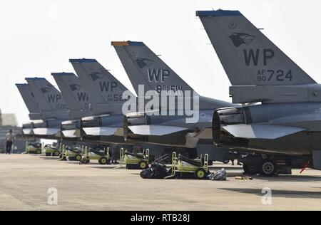 U.S. Air Force F-16 Fighting Falcons, assigned to the 35th Fighter Squadron, Republic of Korea, arrive for Exercise Cobra Gold 2019 at Korat Royal Thai Air Force Base, Thailand, Feb. 6, 2019. Cobra Gold participants conduct multinational force, combined task force events that are vital to maintaining the readiness and interoperability of security forces across the region. Stock Photo