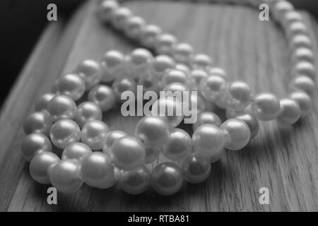 beautiful white marine pearl bead on velvet prepare for wedding ceremony Stock Photo