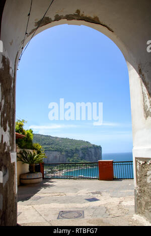 Landscape of Vico Equense, in Italian Sorrento's peninsula,  viewed through an arch in historic center of the town Stock Photo
